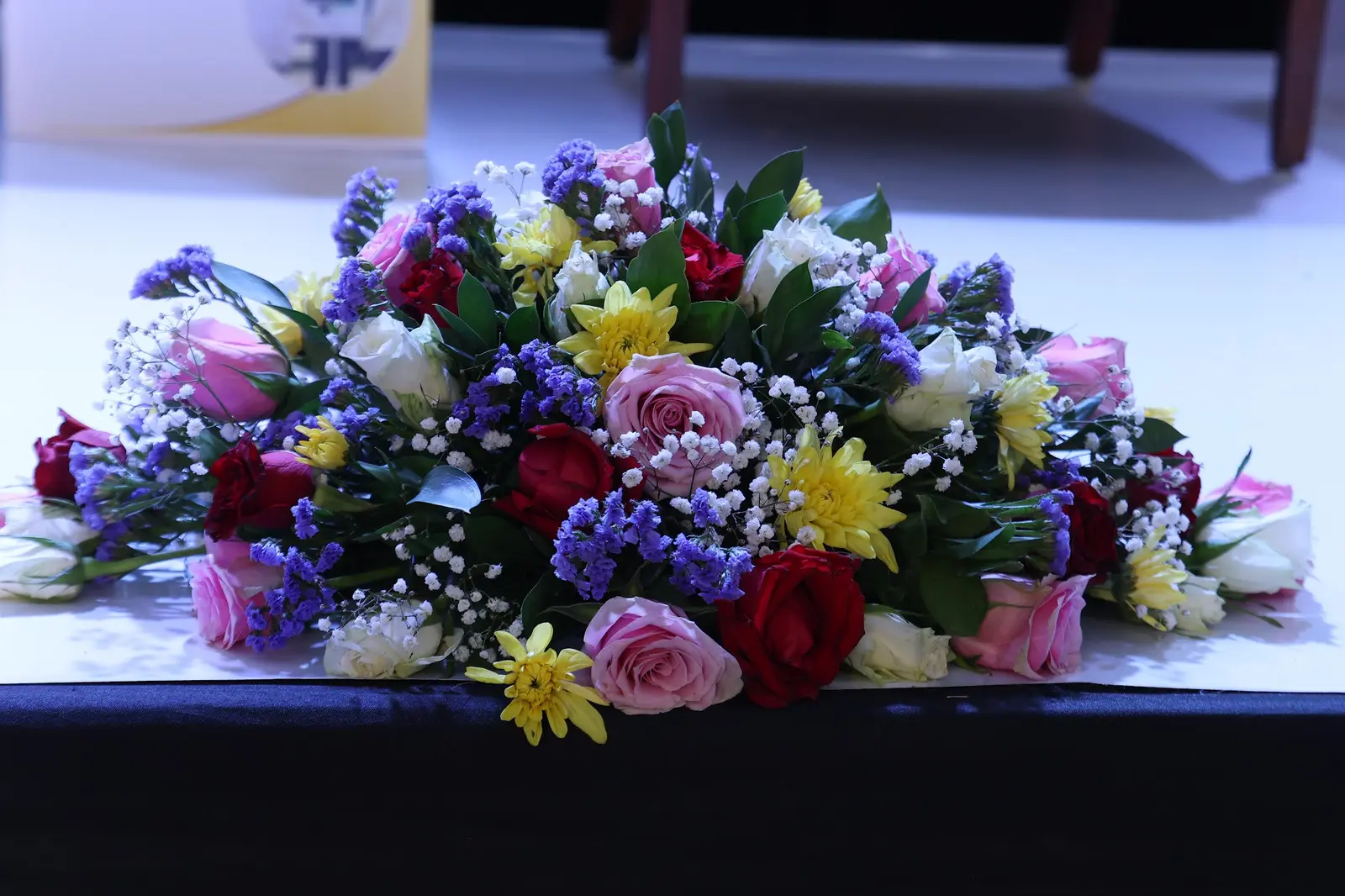 Floral centrepiece on a delegate table