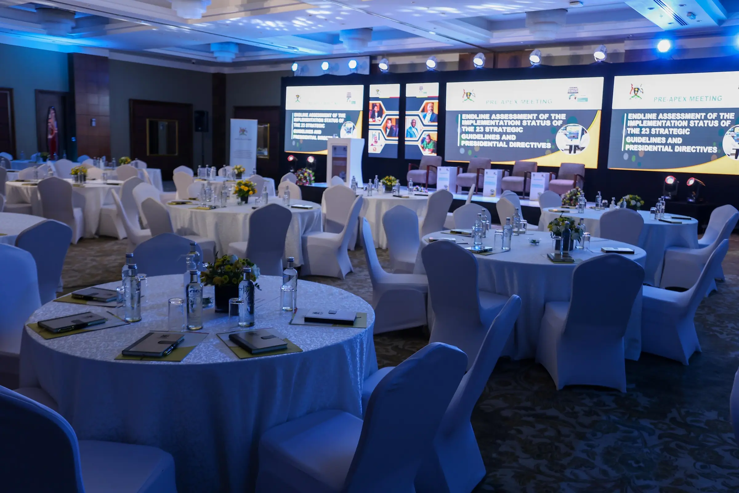 Wide view of the meeting room set for the Pre-APEX Meeting
