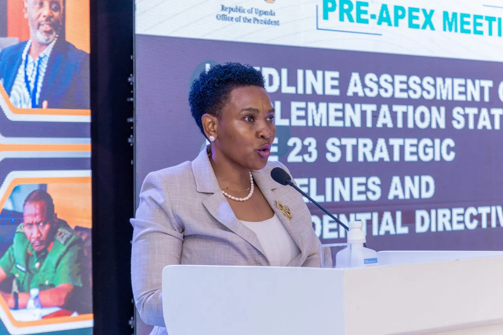 Speaker at the podium in front of the endline assessment slide