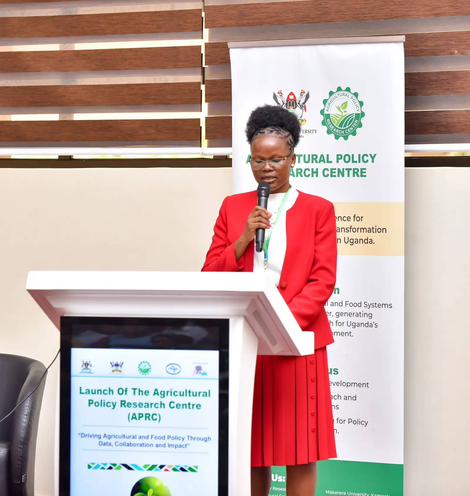 Speaker in red at the APRC launch podium