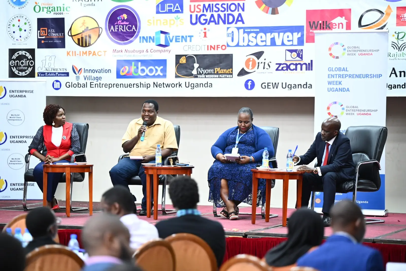Panel discussion on stage at Global Entrepreneurship Week Uganda