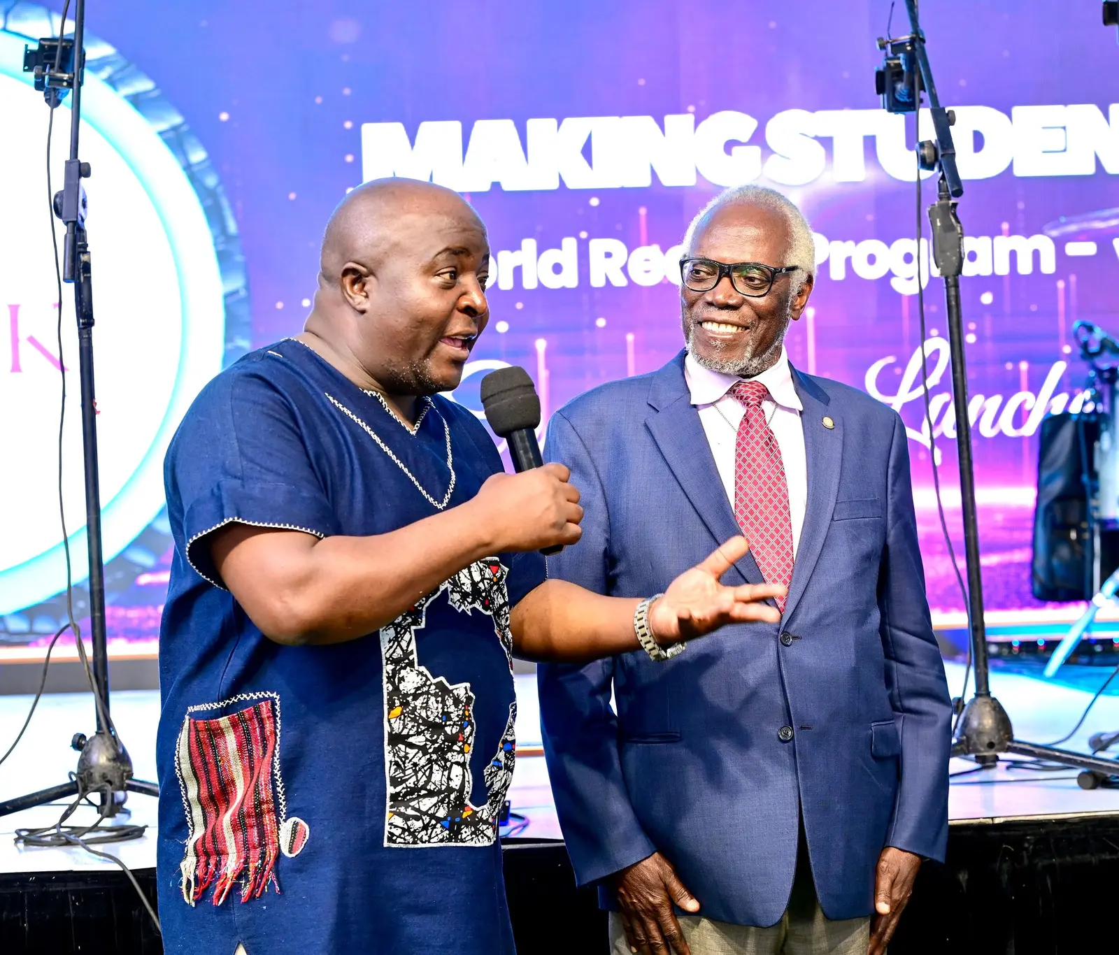 Two speakers sharing the stage at the KSK Foundation event