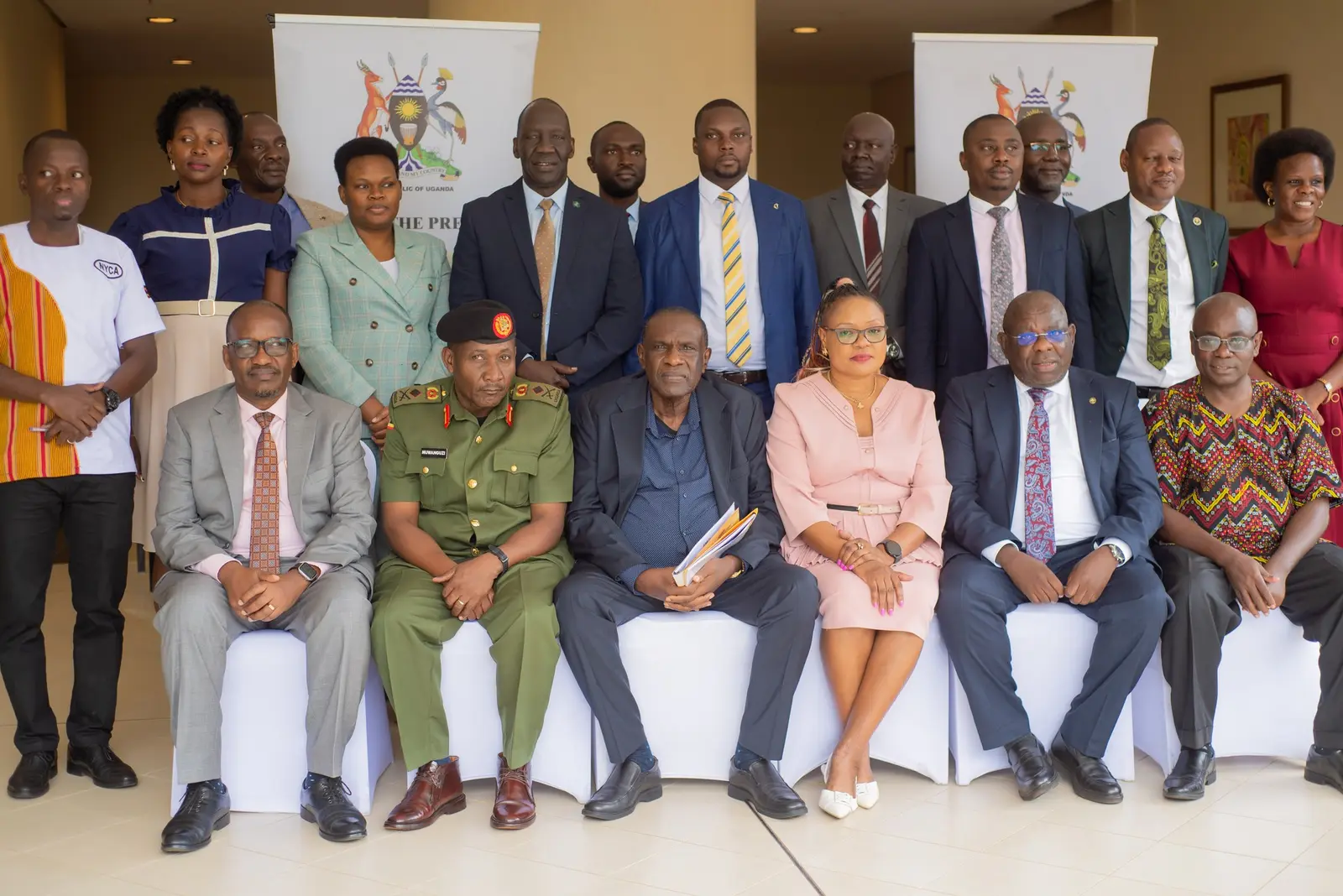 Officials gathered for a group photo at an Office of the President forum