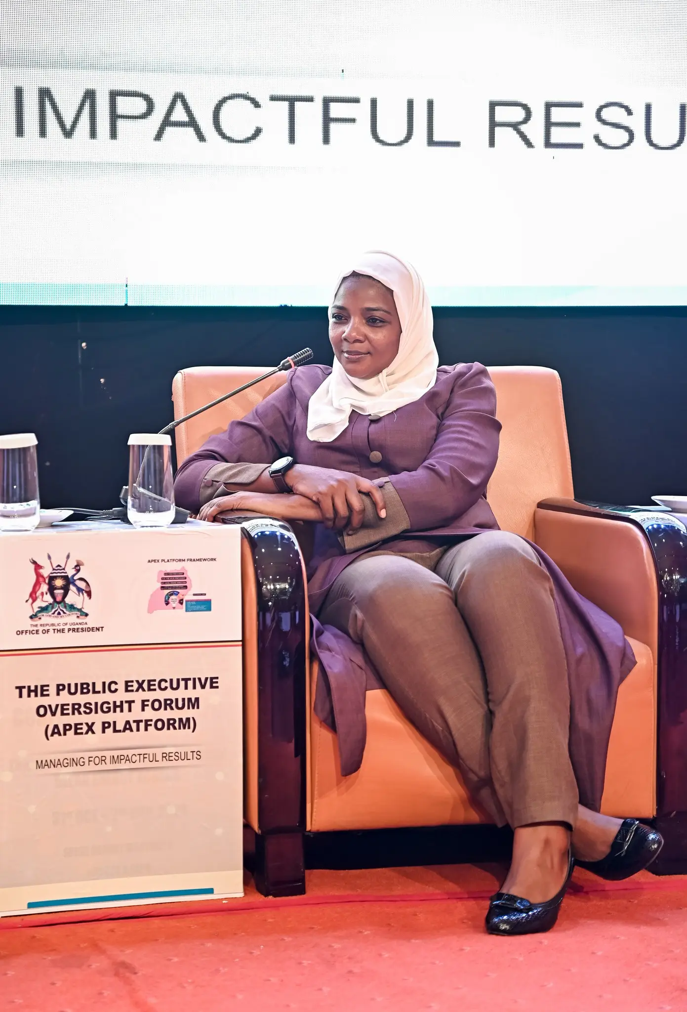 Panellist seated on stage at the APEX Platform forum