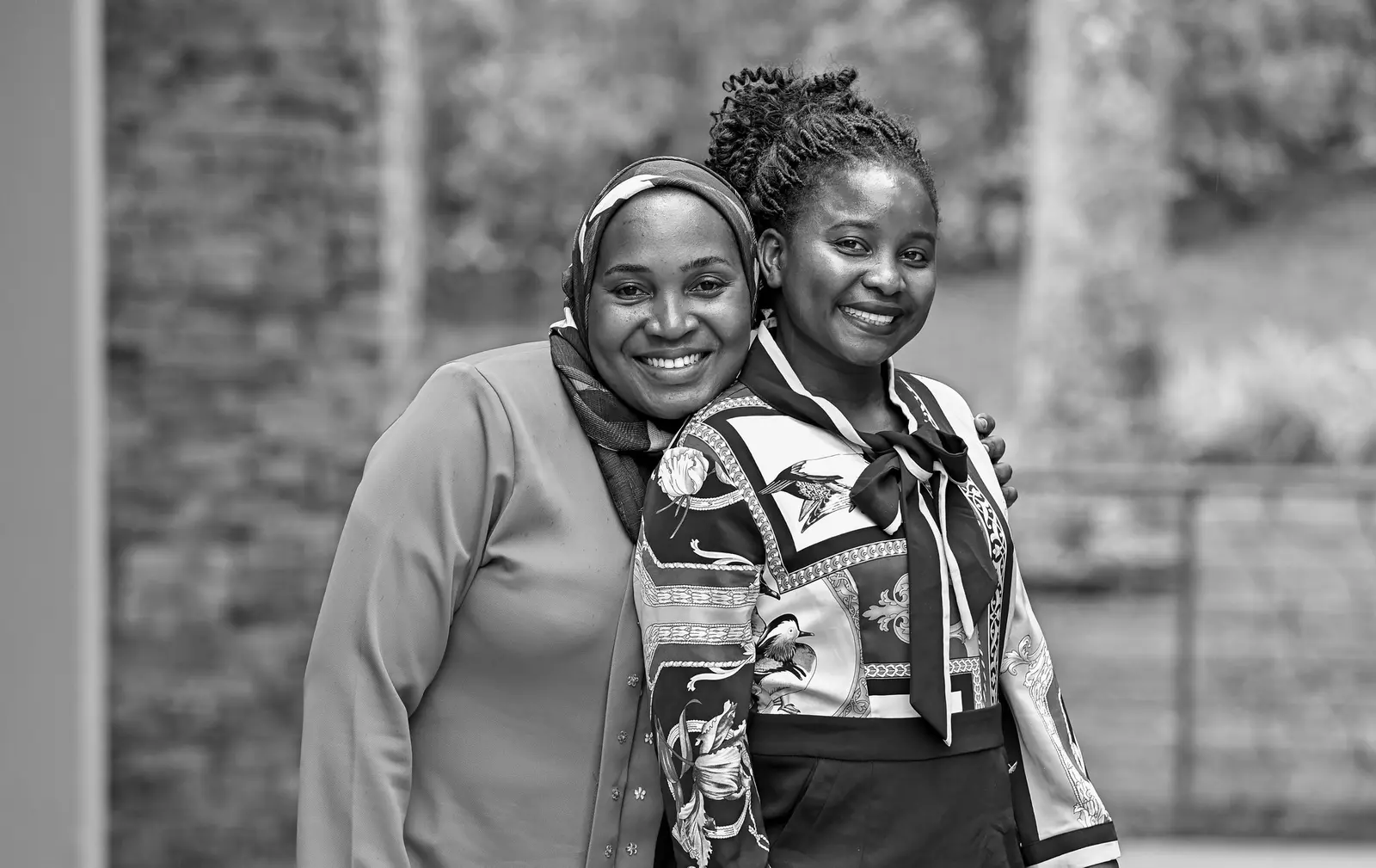 Black and white portrait of two forum guests