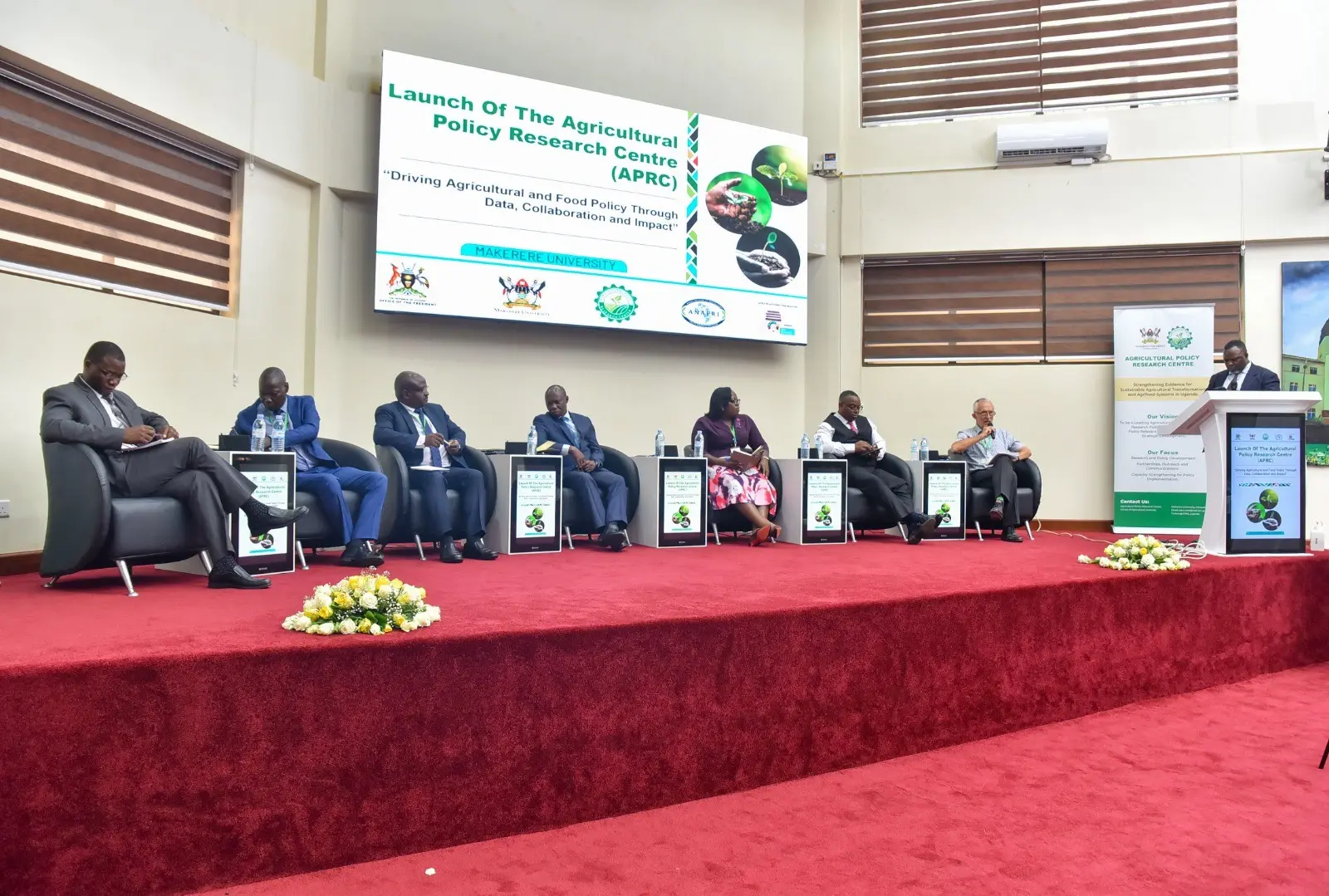 Panel on stage at the launch of the Agricultural Policy Research Centre