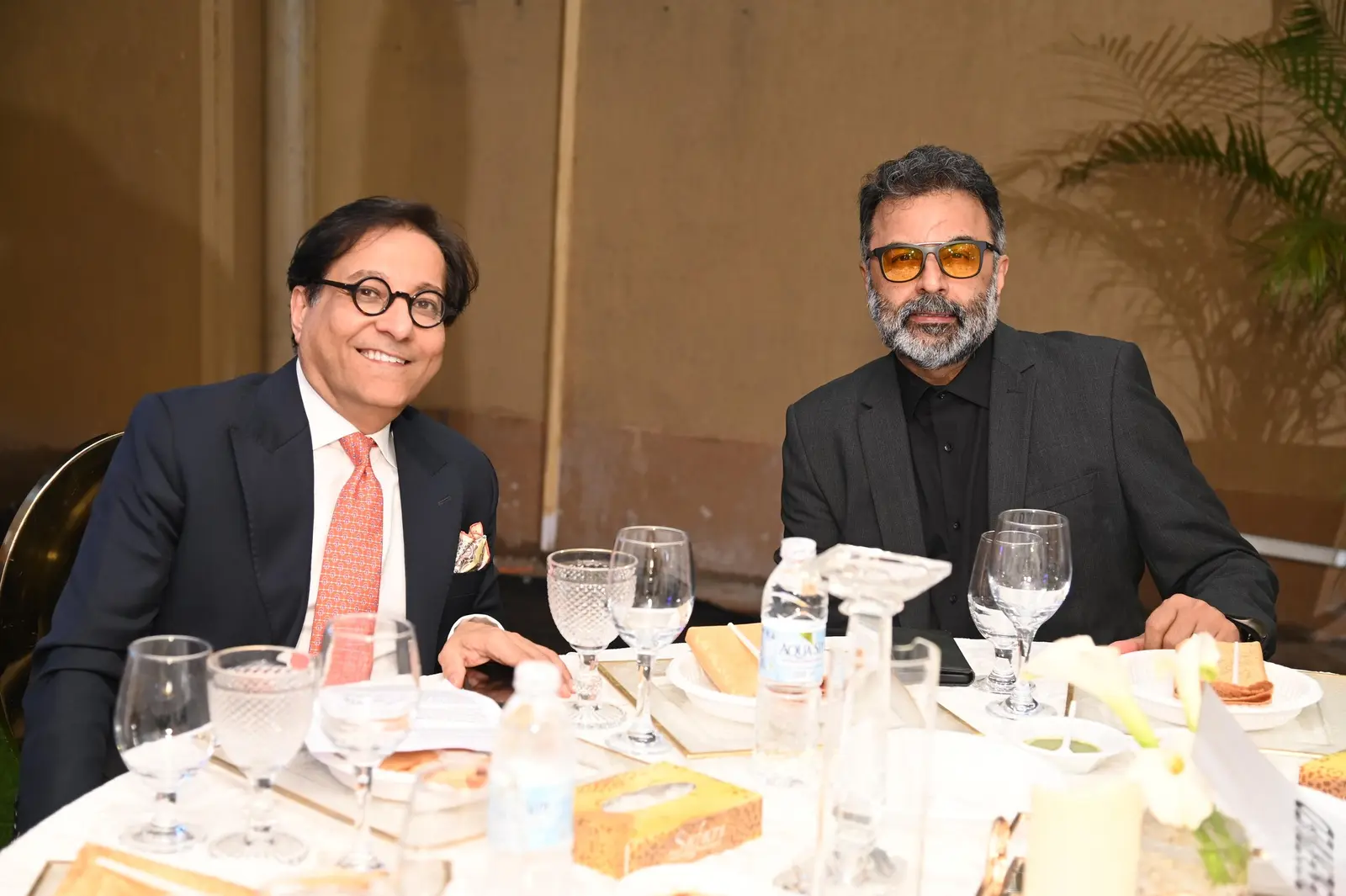 Guests seated at a dinner table