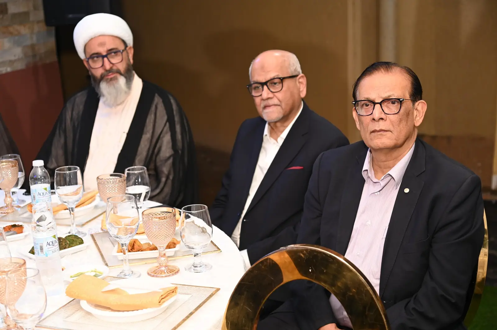 Community leaders at a dinner table