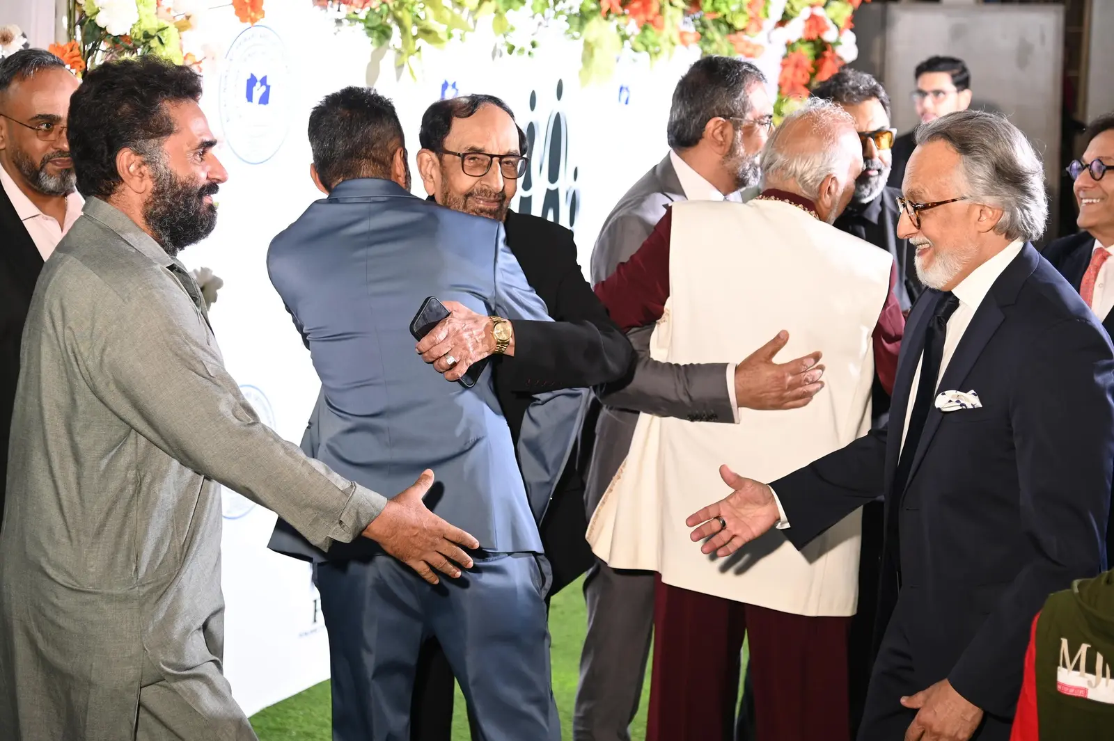 Guests embracing at the Punjani Charitable Trust event